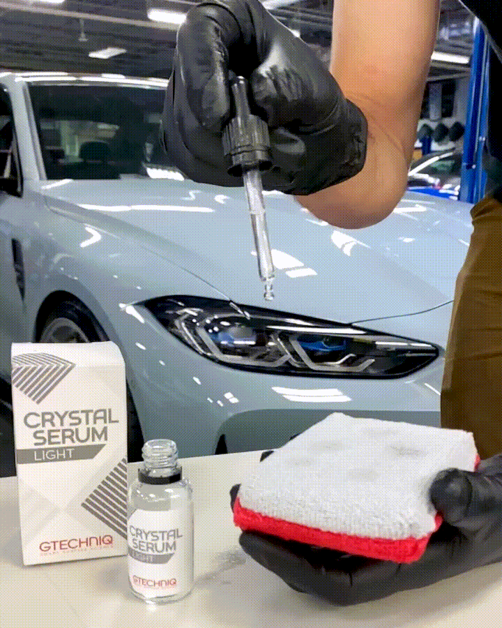 Julian of Automotive Specialty Wraps applying ceramic coating to an applicator sponge