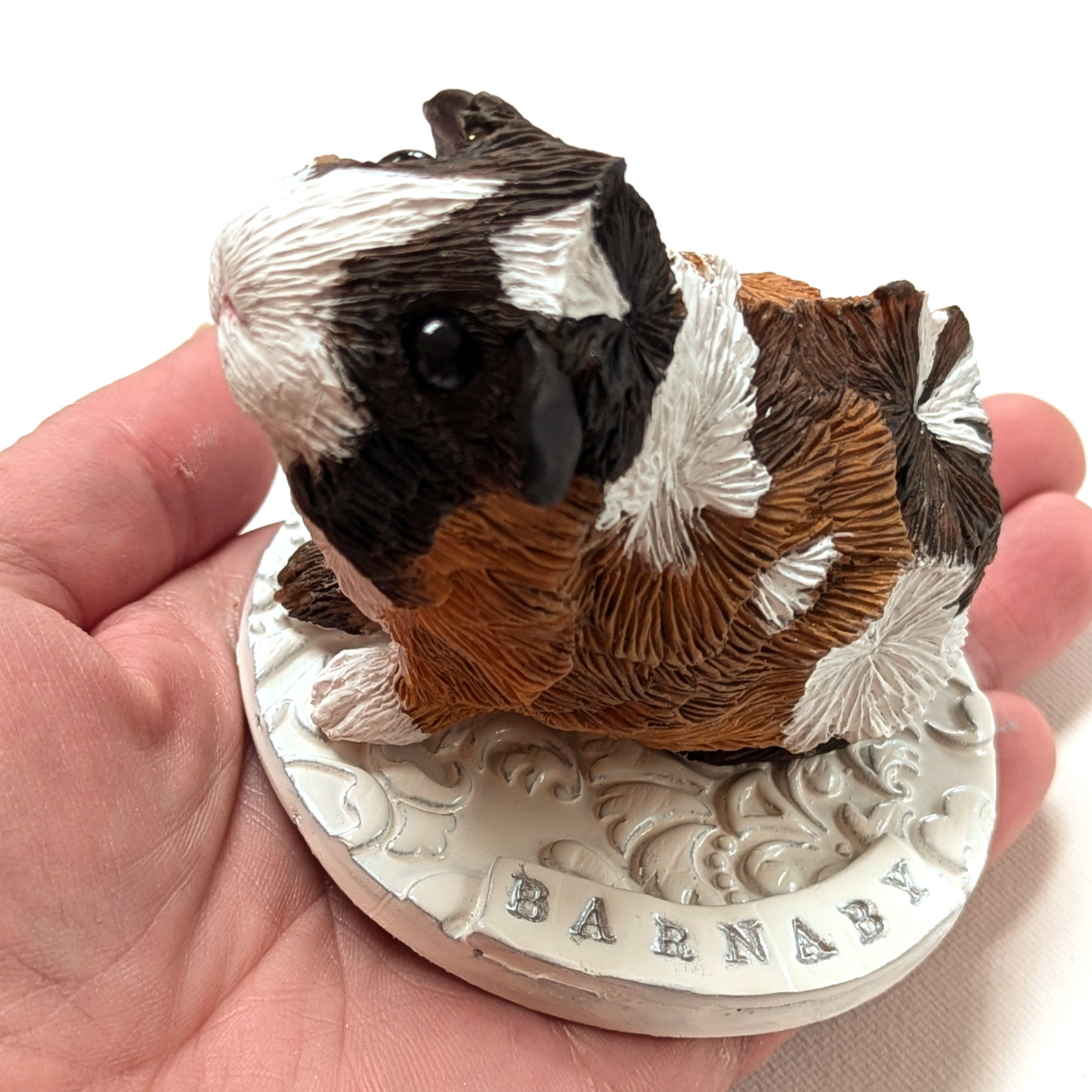 A LARGE custom sculpture with named base