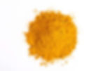 A vibrant, golden-yellow pile of turmeric powder is centered against a stark white background, highlighting its rich color and fine texture