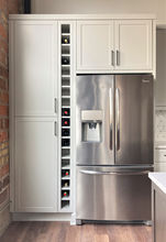 Downtown Minneapolis Loft Kitchen
Stained rolling white oak island, Karndean Mid Limed Oak luxury vinyl flooring, exposed brick  wall, Sherwin Williams Repose Gray, Cambria Swanbridge, matte black cabinet pulls, glass shelves, LED tape lighting, Besa Wave 10 pendants Smoke. Kohler Vault K3839-1-NA sink,  American Standard 
Edgewater Kitchen Faucet 7077131, wine cubbies, side by side stainless steel french door bottom freezer refrigerator