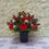 Thumbnail: Grave, cemetry flowers red with berries