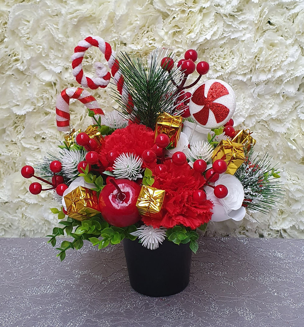 Thumbnail: CHRISTMAS TRIBUTE FLOWERS