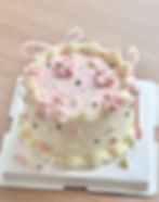 Pink bow tie cake with petals