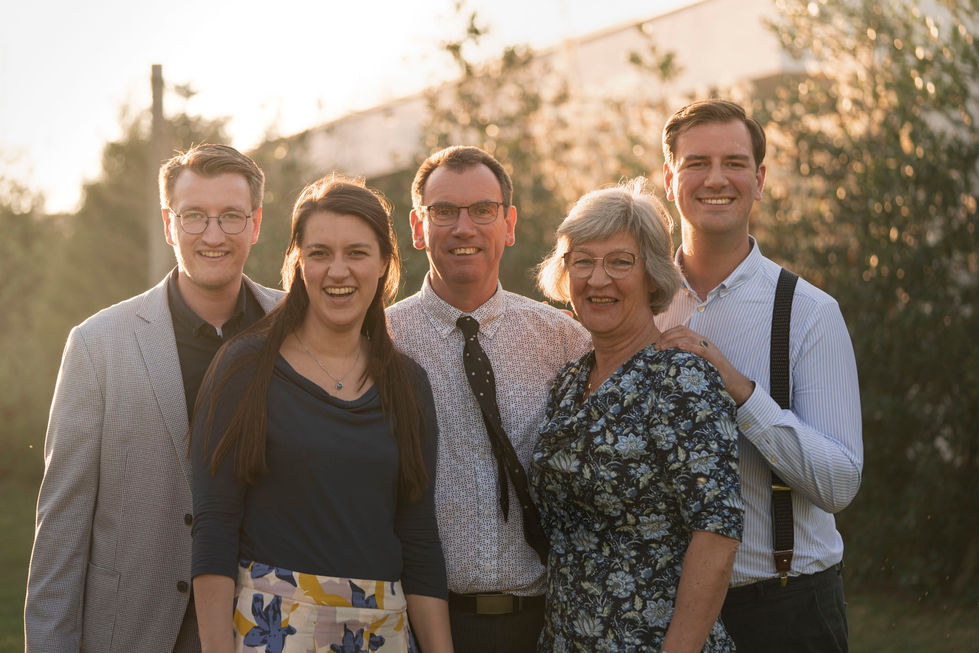 Nuclear family during golden hour family shoot in Central Netherlands, authentic family photography