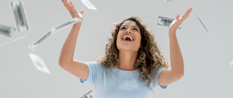 Woman celebrating cash prize - lottery winnings