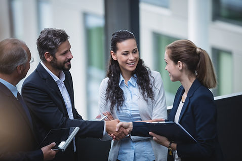 businesspeople-having-discussion-office.jpeg