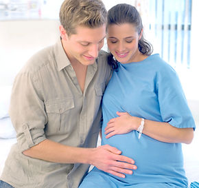 Expecting Parents Smiling_edited.jpg