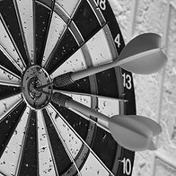 Dart arrow on red dot point_edited_edite