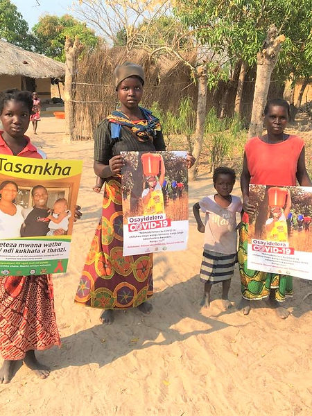 Community-Members-Receiving-IEC-Materials-2020.jpg
