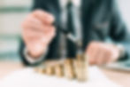 increasing stacks of coins signifying revenue growth after investing in SEO