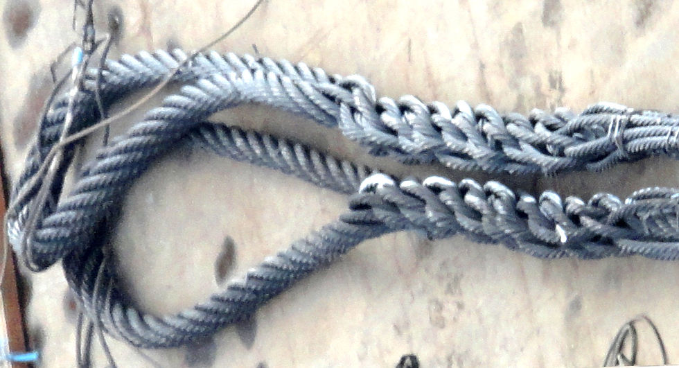 An eye splice in wire rope — the tail is buried back through the standing line to form a permanent loop