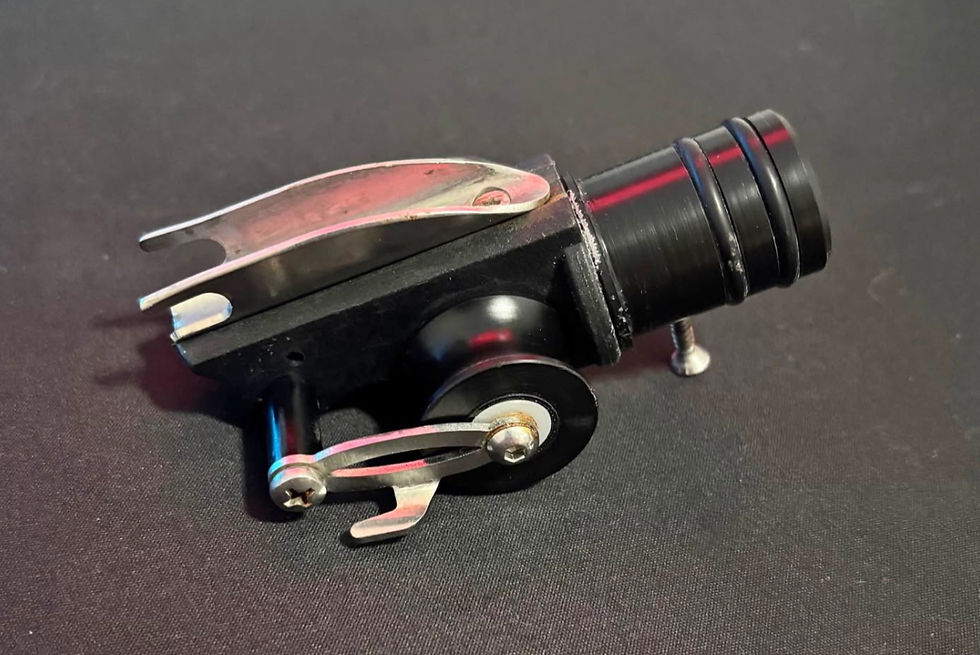 Placeholder: a standard roller speargun shows pulleys mounted at the muzzle