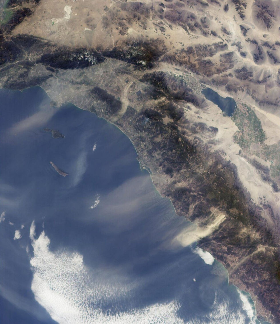 Santa Ana winds streaming offshore over the Pacific, seen from orbit