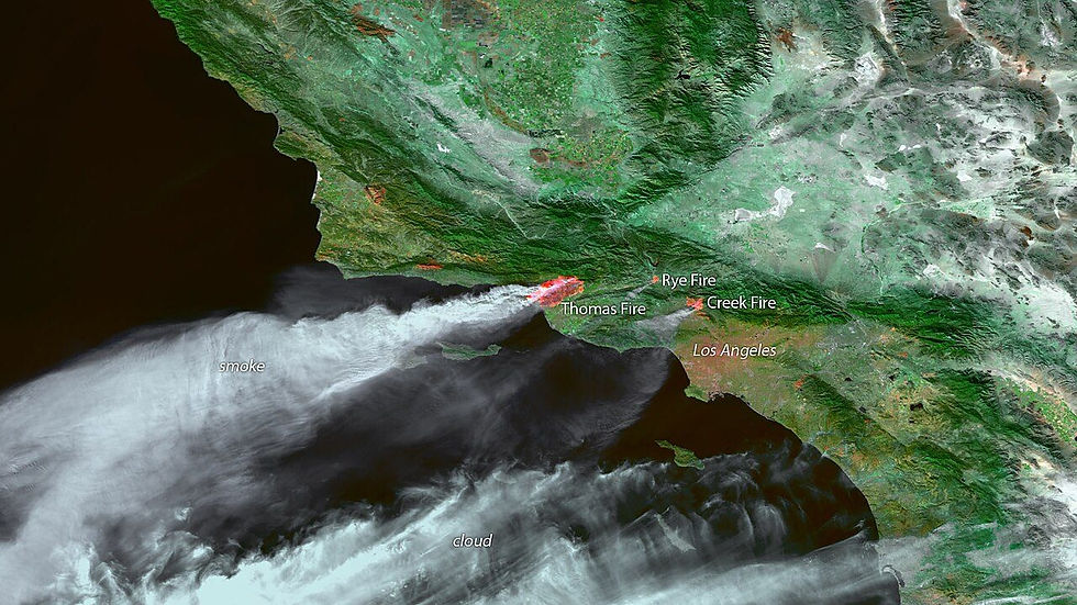 Santa Ana winds driving smoke and dry air offshore over Southern California