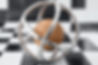 Silver Torus and Wooden Sphere On A Black and White Grid_edited.jpg