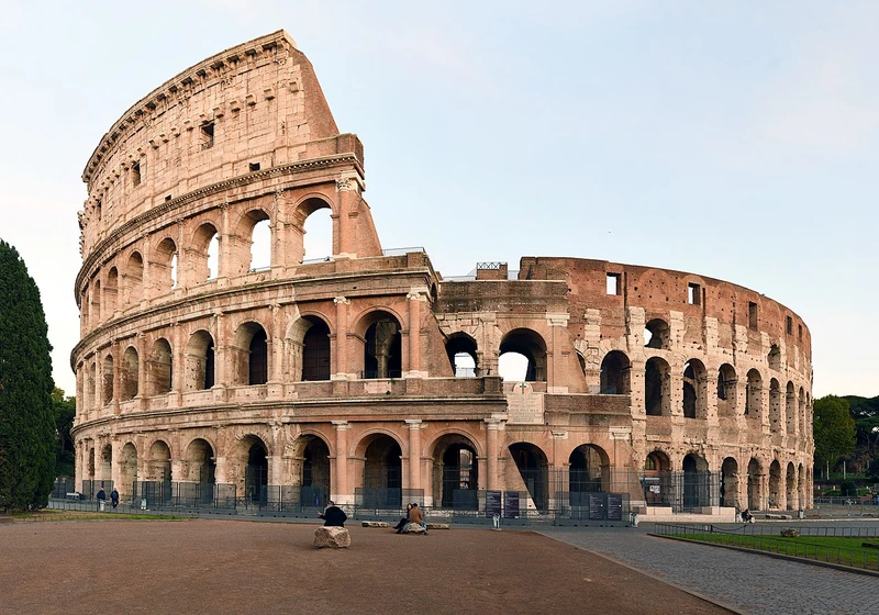 Ancient Roman Colosseum at sunset, symbol of enduring human civilization across 6,000 years