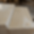 Close-up view of polished Egyptian marble with beige veining.