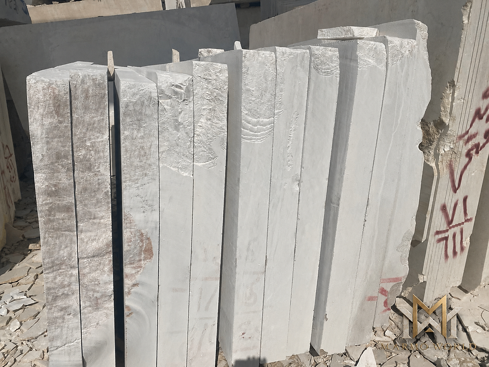 Slabs of Sinai Pearl Egyptian Marble in a stone yard