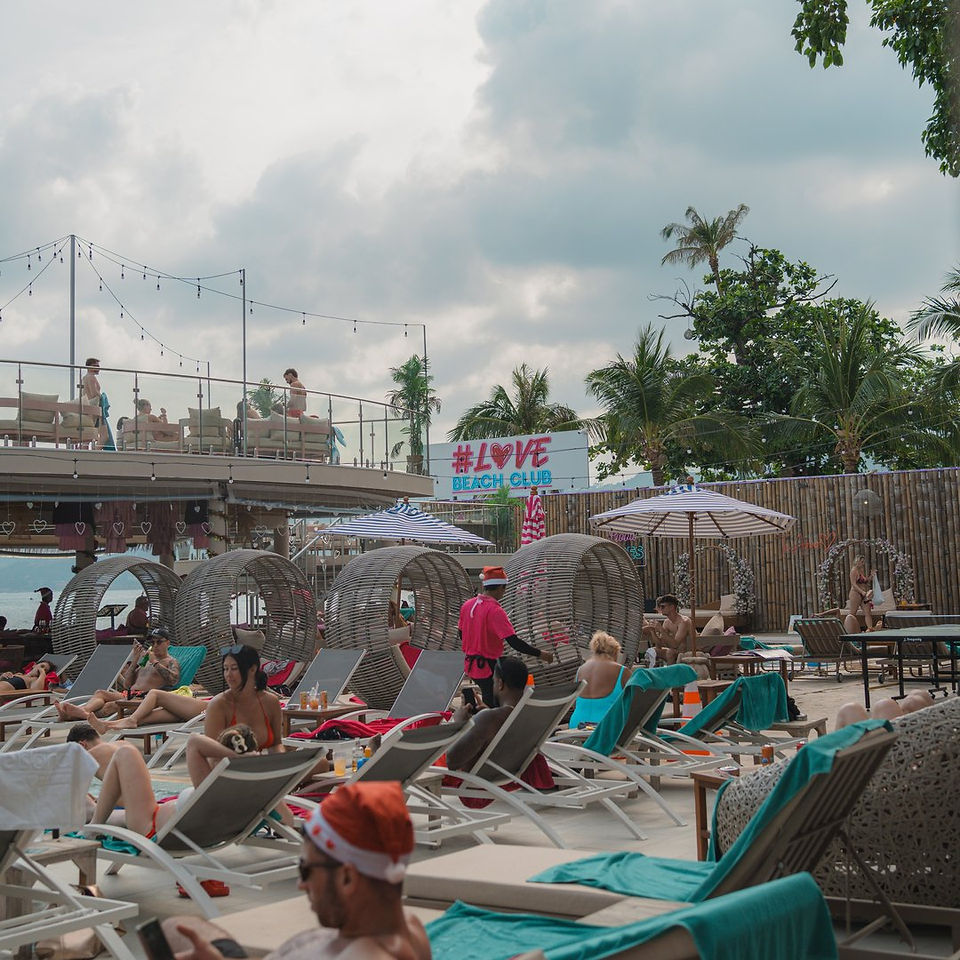 The pool deck and the rooftop at Love Beach Club at Christmas