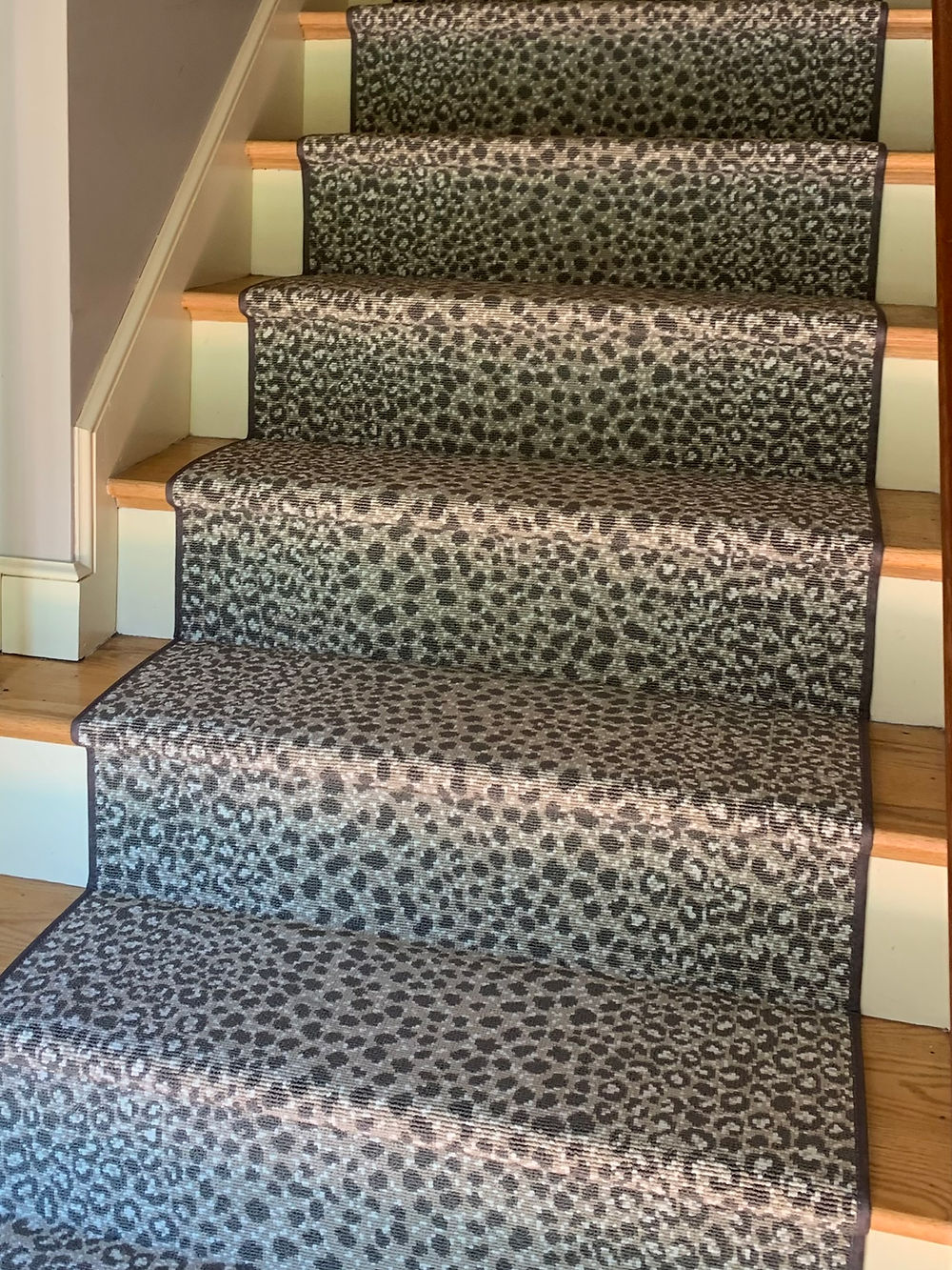 Leopard print carpeted staircase