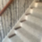 Interior design: Carpeted staircase with birch wallpaper
