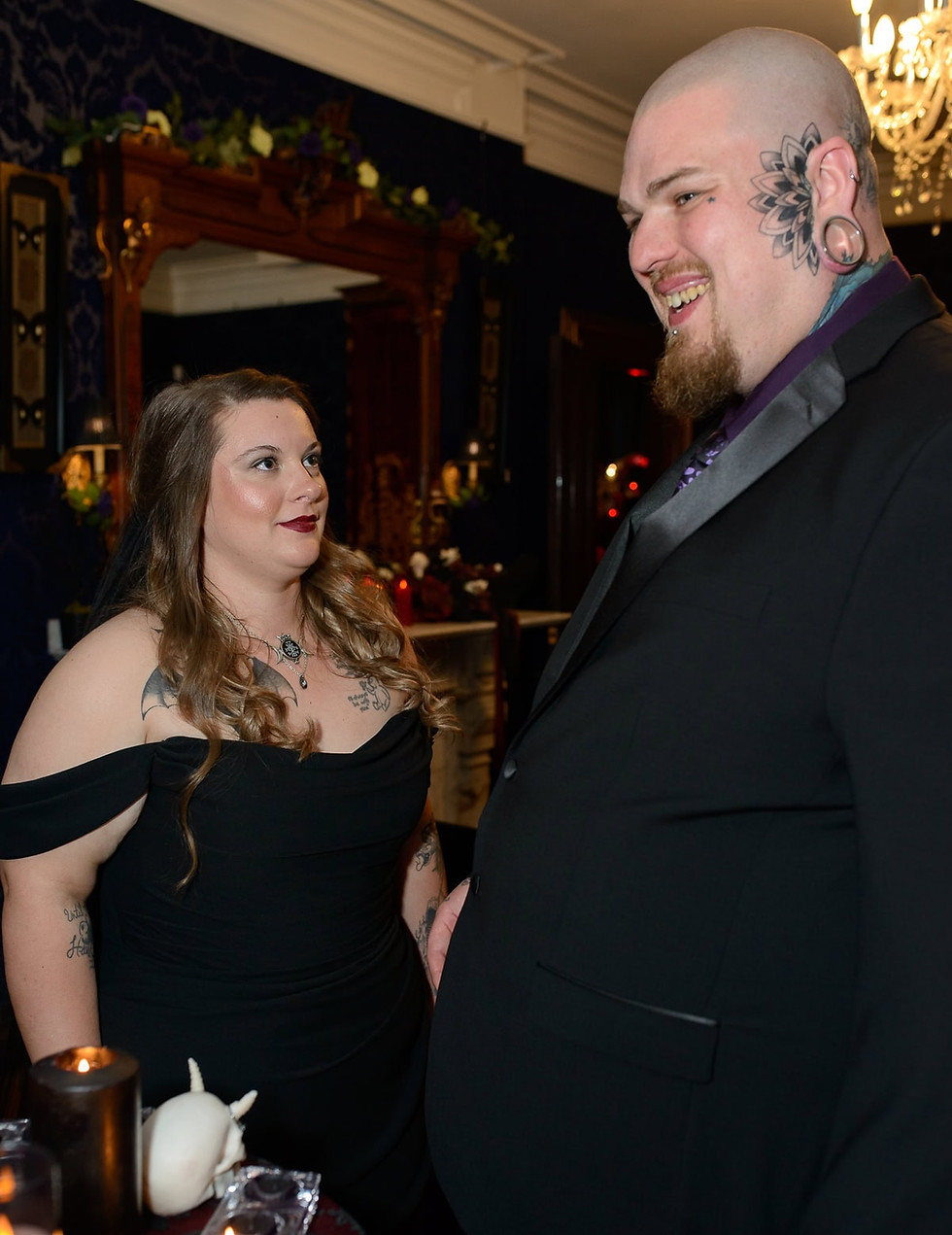 bride-and-groom-at-alter-in-the-satanic-chapel.jpg