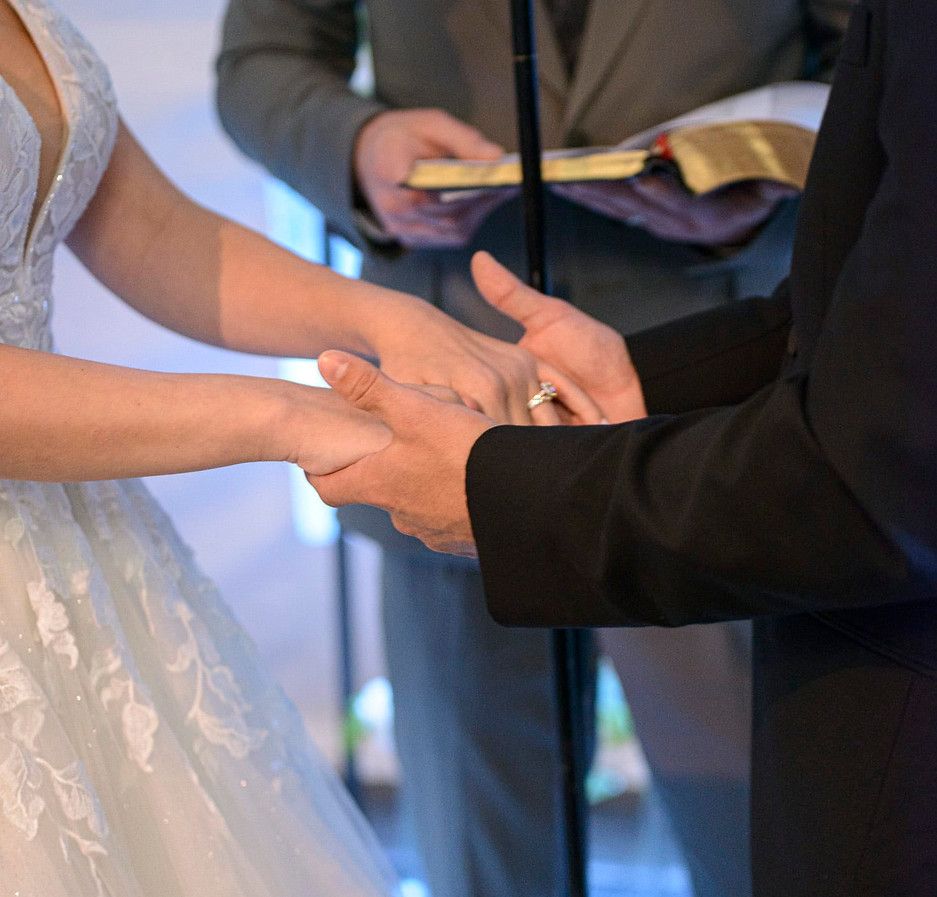 bride-and-groom-holding-hands.jpg