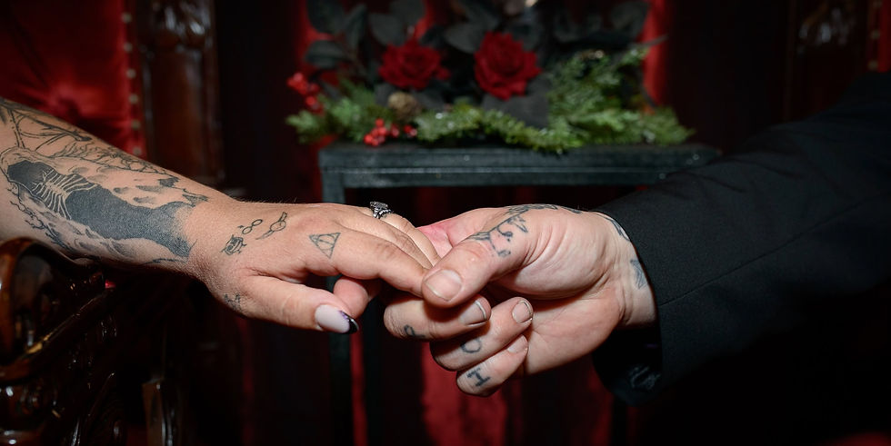 newlyweds-closeup-of-tattooed-hands.jpg
