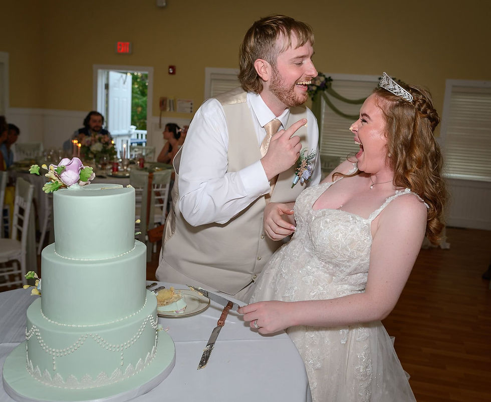 let-them-eat-cake-fun-shot-of-bride-and-groom.JPG