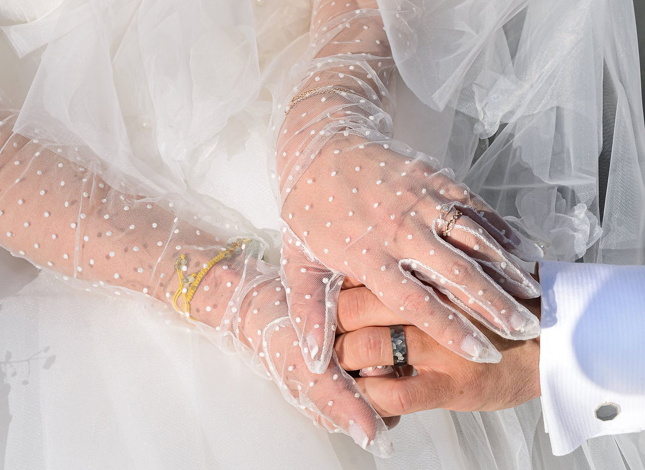 closeup-photograph-of-brode-and-grooms-hands.jpg