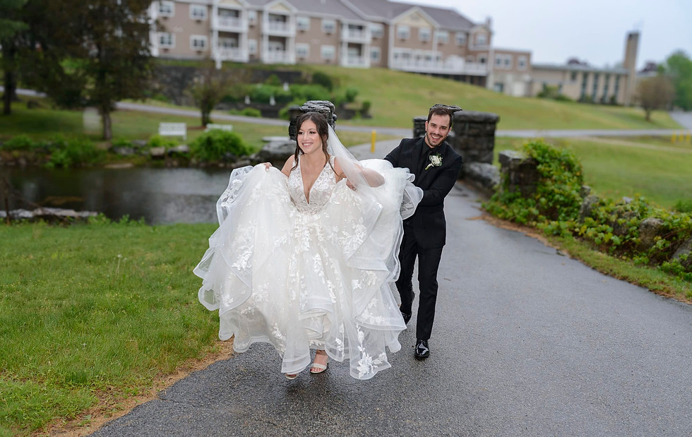 portrait-bride-groom-walking-in-drizzle-wide-shot.jpg