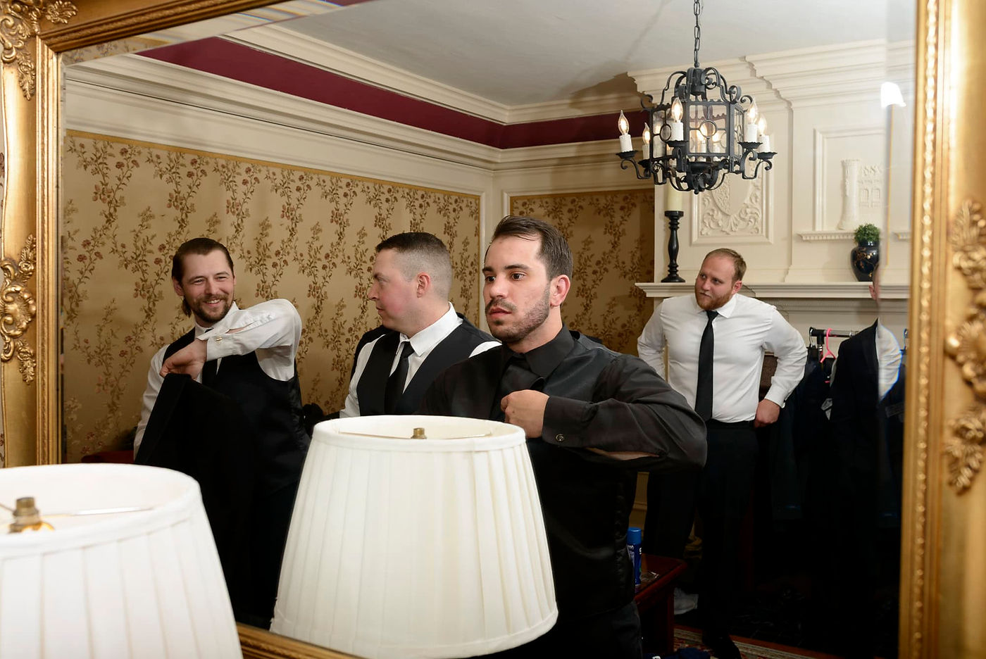 mirror-shot-of-groom-getting-ready.jpg