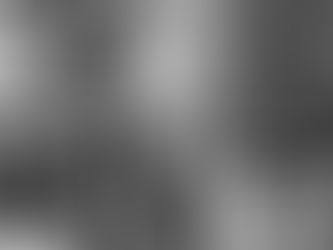 Black and white wedding portrait of couple outside Brattle Book Shop in Boston book alley