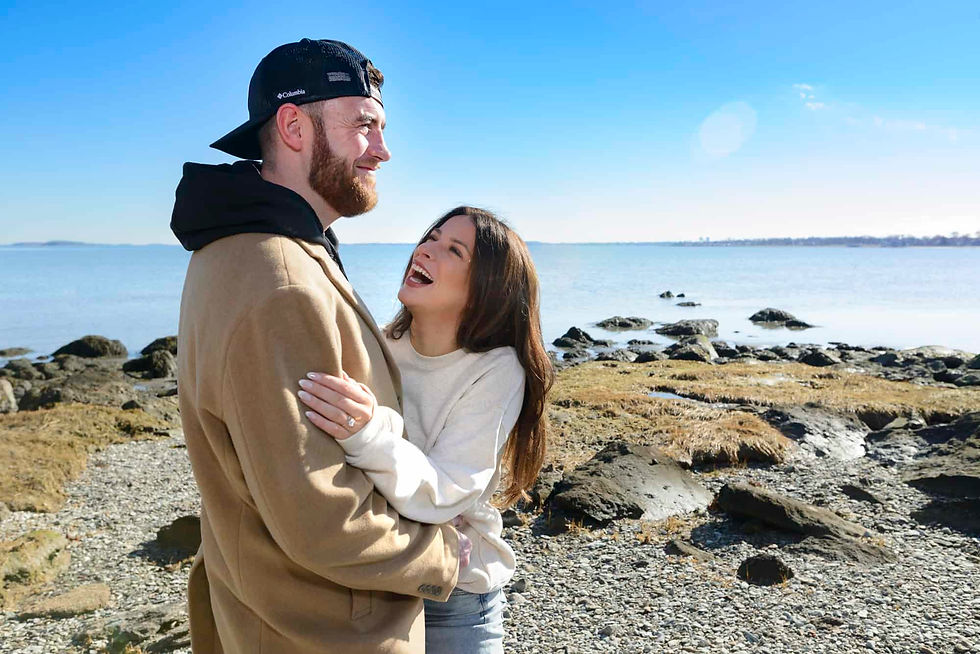 engaged-couple-on-the-beack-at-moswetuset-in-quincy-ma.jpg