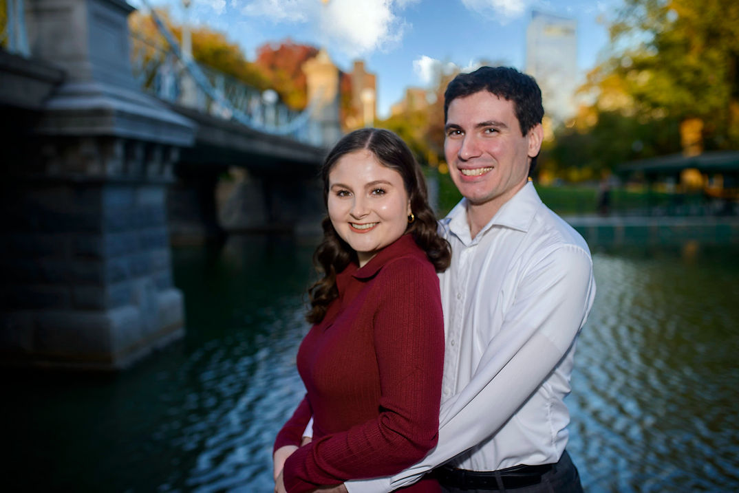 smiling-engaged-couple-standing-close-to
