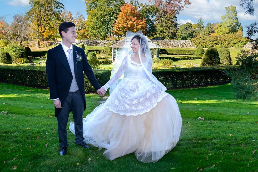 newly-weds-walking-in-a-lush-garden-ron-richman-photography.jpg