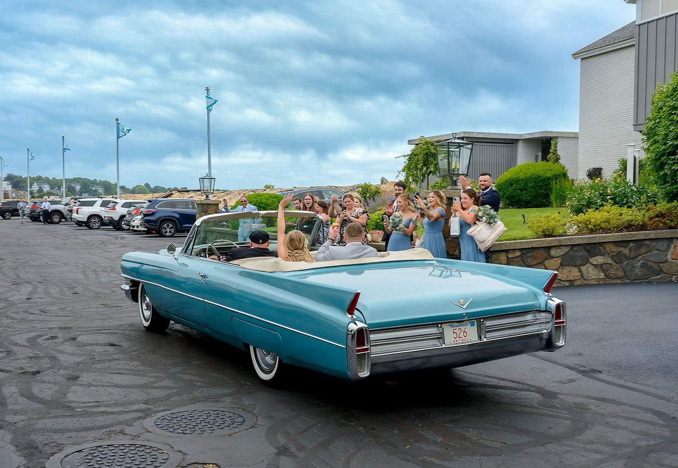 ocean-beach-wedding-blue-caddy-convertable-exit.jpg