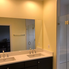 Close up of a freshly painted Centerville bathroom painted with yellow Benjamin Moore color.