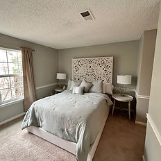A Aldie, Virginia home featuring primary bedroom walls painted by expert local painter Wall Master LLC. The walls were painted with a stunning Benjamin More greyish neutral color and the ceilings and trim in a white.