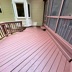 A deck stained/painted with a dark brown Benjamin Moore color in Springfield, Virginia.