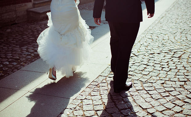 Bride and Groom Walking Away