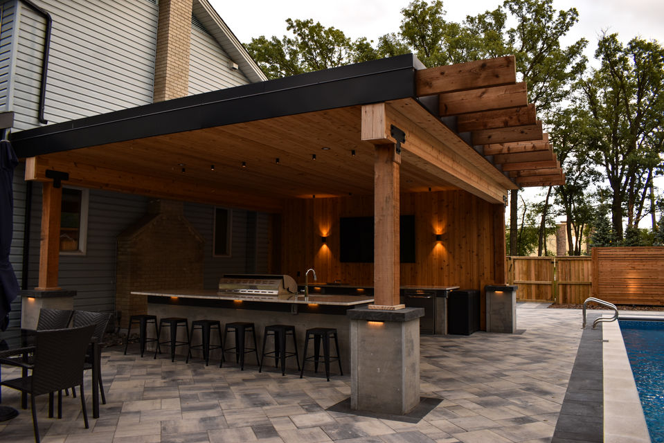 luxury pool house, large patio area, large outdoor entertainment area, outdoor kitchen, large outdoor dining area, bar top area, professional landscape lighting