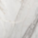 white and grey marble surface with dotted sunlight on the surface.jpg