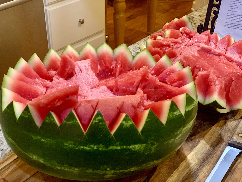 Cutting open a watermelon