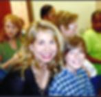 Mom and son sitting.