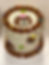 Small white birthday cake with brown bear faces and hats