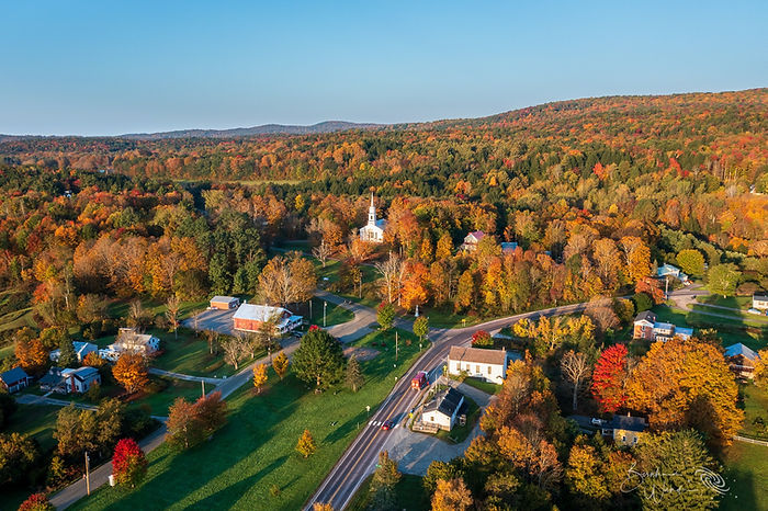 arial view of Westford Vermont. Fall foliage and buildings.