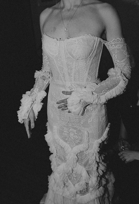 editorial wedding photography- dorset wedding photography. black and white chic vintage style wedding photo in black and white, capturing a bride wearing a wedding dress with frilly sleeves 