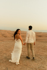 agafay luxury camp in morocco, bride and groom elopement photos in the desert