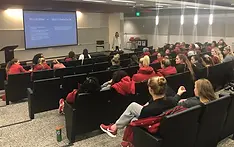 Dr. Blakely delivering keynote on self-compassion and mental performance to University of Arkansas women athletes